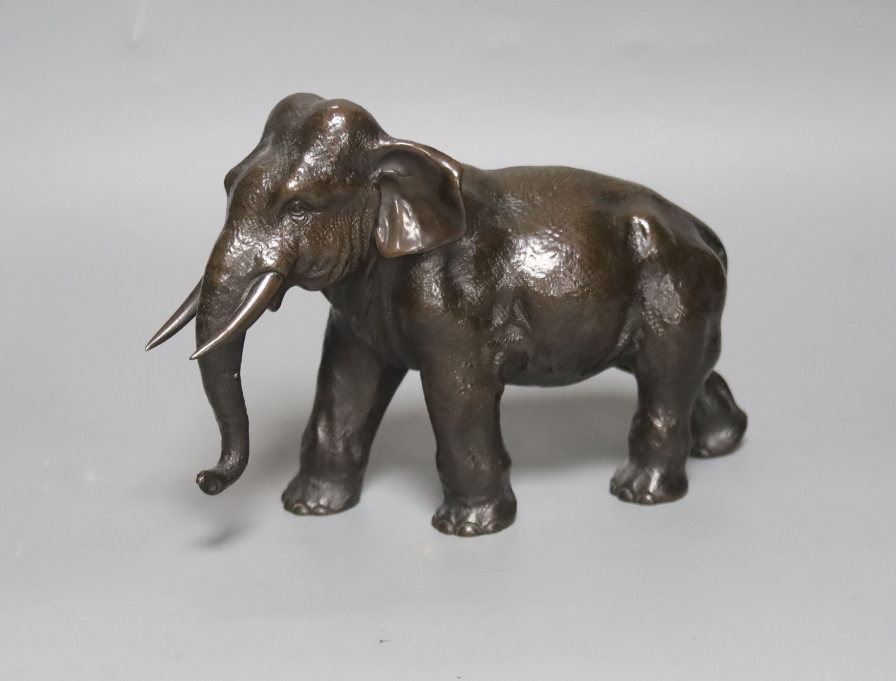 A Japanese Meiji period bronze elephant, 22cm